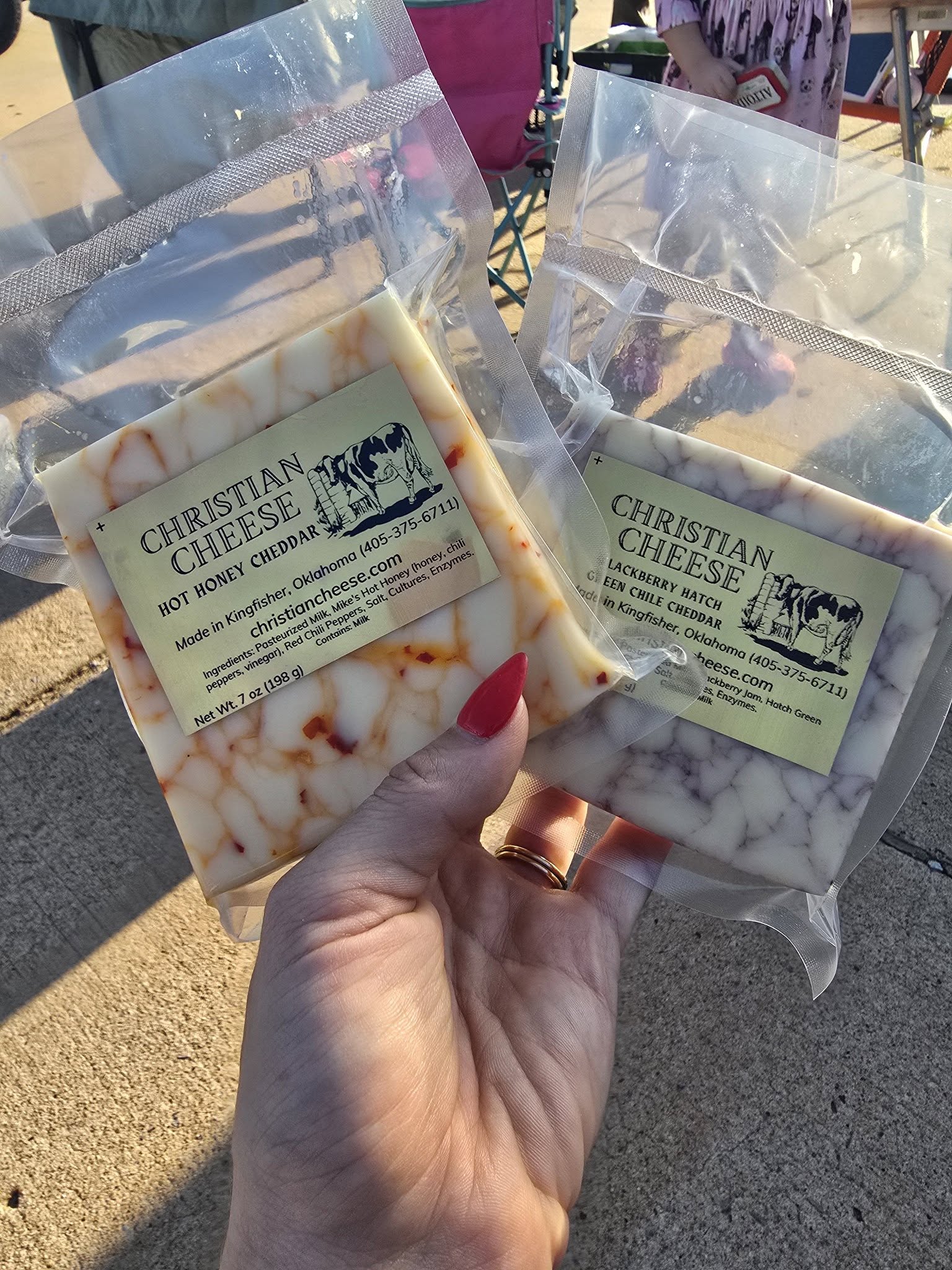 Packages of Christian Cheese cheddar